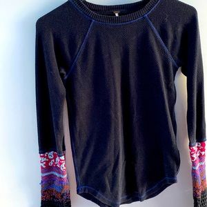 Free People shirt, black and multi-colored sleeves, slightly used, small